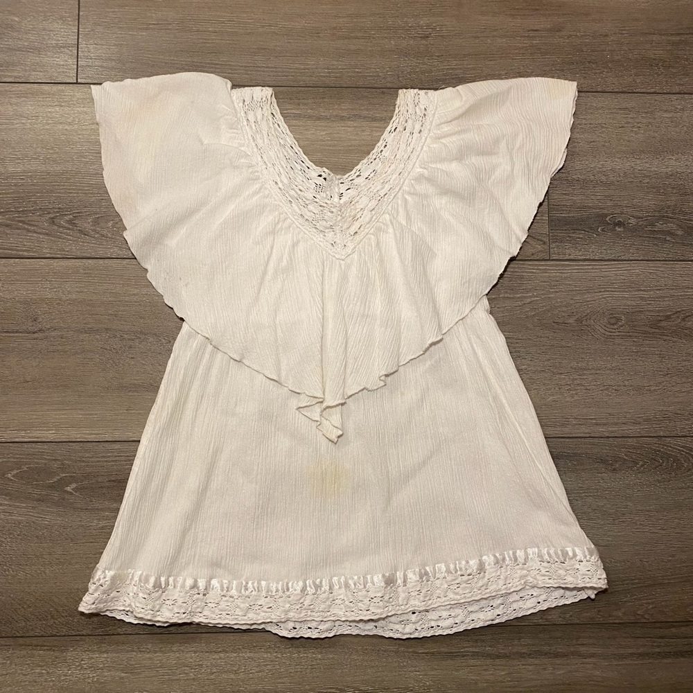 White flowy top